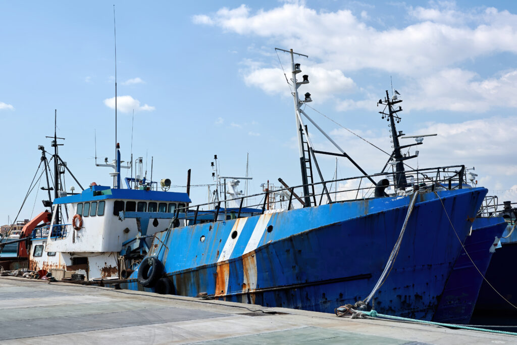 Old and rusty boat in the wharf of Limassol, Cyprus